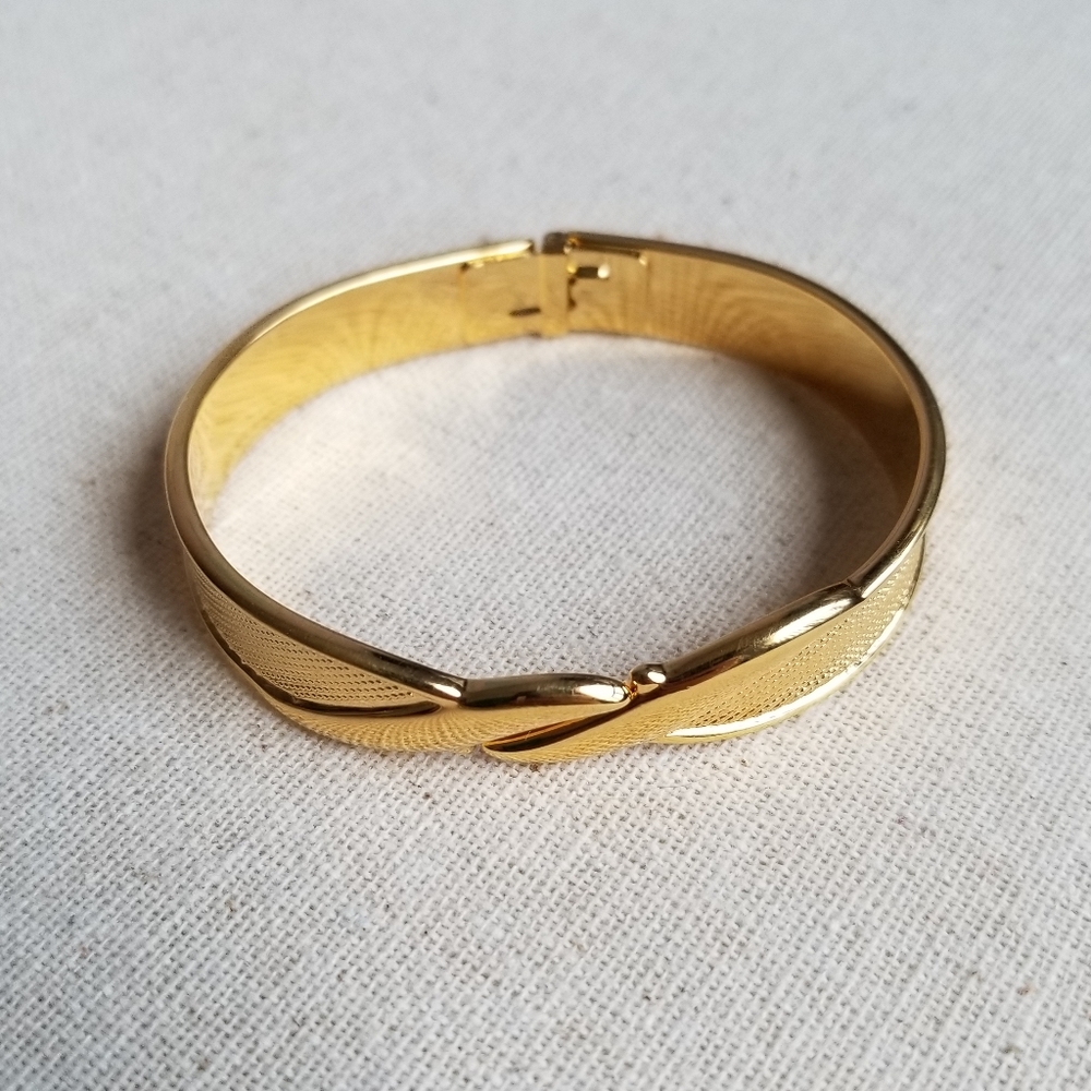 Monet Gold Tone Clamper Bracelet